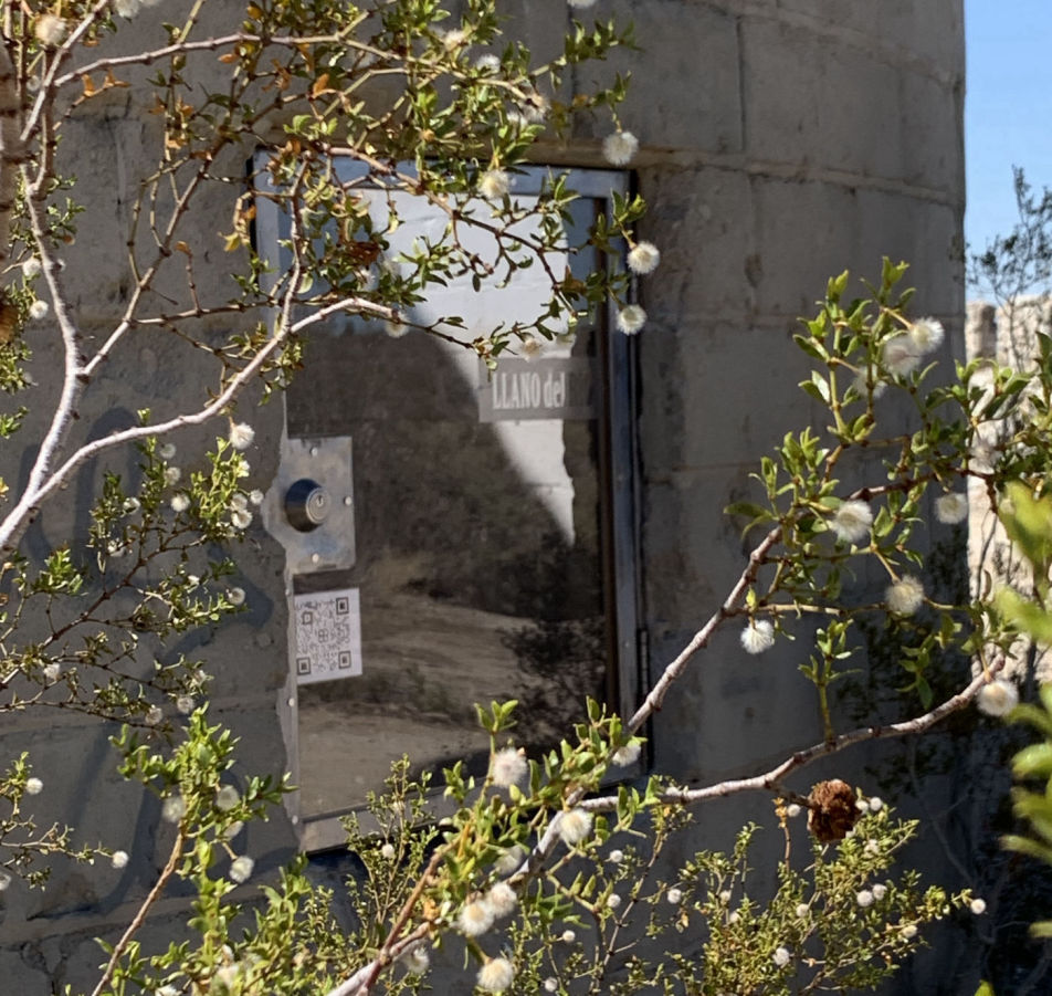 An AR exhibit QR code on the silo door